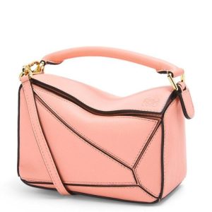 The Loewe Puzzle small bag in Blossom calfskin leather Replica is a beautiful and feminine bag that is perfect for everyday use. The bag features